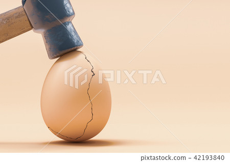 Cracked eggshell hit by hammer Cracked eggshell hit by hammer 42193840