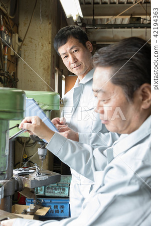 Factory People Working Drills Factory People Working Drills 42194363
