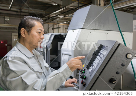 Factory person working machining Factory person working machining 42194365