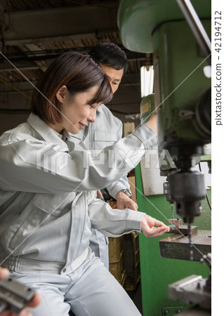 Factory People Working Drills Factory People Working Drills 42194712
