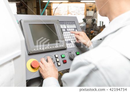 Factory person working machining 42194734
