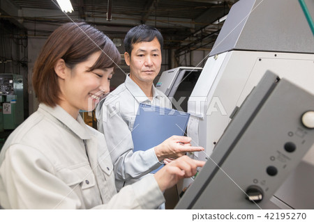 Factory person working machining Factory person working machining 42195270