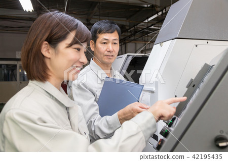 Factory person working machining Factory person working machining 42195435