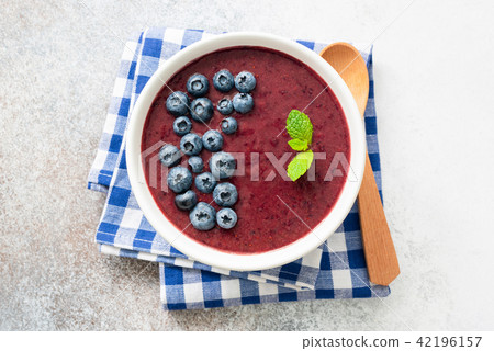 Vegan acai smoothie bowl with blueberries Vegan acai smoothie bowl with blueberries 42196157