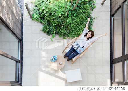 Young lady terrace balcony 42196438