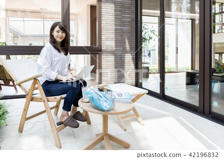 Young lady terrace balcony 42196832