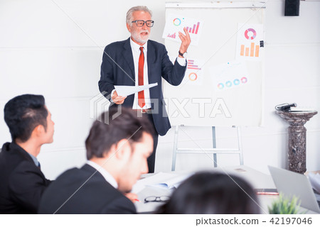 Businesspeople meeting and discussing Businesspeople meeting and discussing 42197046