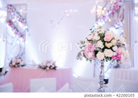 Wedding bouquet in restaurant on the table Wedding bouquet in restaurant on the table 42200105