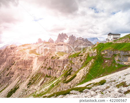 Auronzo mountain hut, aka Rifugio Auronzo, at Tre Cime massive, Dolomites, Italy. Auronzo mountain hut, aka Rifugio Auronzo, at Tre Cime massive, Dolomites, Italy. 42200567