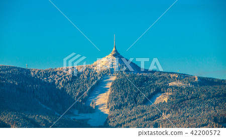 Morning sunrise at Jested Mountain and Jested Ski Resort. Winter time mood. Liberec, Czech Republic Morning sunrise at Jested Mountain and Jested Ski Resort. Winter time mood. Liberec, Czech Republic 42200572