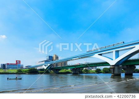 Fan Bridge over Arakawa and Territor Liner and Fishing Boat 42200736