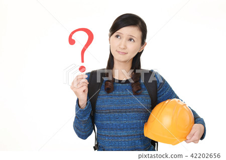 A woman with a question mark A woman with a question mark 42202656