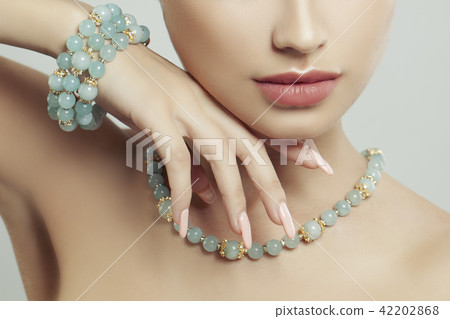 Perfect jewelry on female body, closeup portrait Perfect jewelry on female body, closeup portrait 42202868
