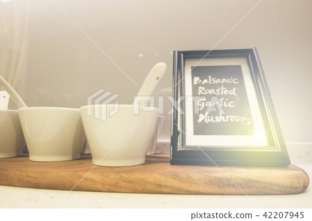 Closeup of white plates and dinnerware display Closeup of white plates and dinnerware display 42207945