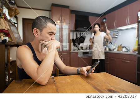 Men and women fighting 42208317