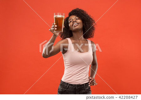 Sexy young afro woman drinking beer, not isolated on white background 42208427