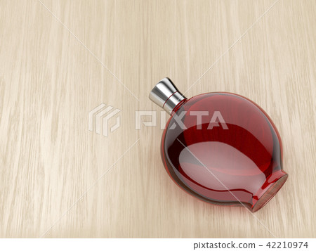 Liqueur bottle on wood background 42210974