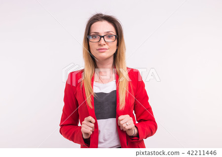 Portrait of beautiful young woman wearing red jacket and glasses. Portrait of beautiful young woman wearing red jacket and glasses. 42211446