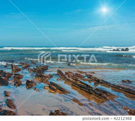 Rock formations on sandy beach (Portugal). Rock formations on sandy beach (Portugal). 42212368