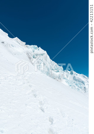 Winter snow covered mountain peaks in Caucasus. Great place for winter sports 42213151
