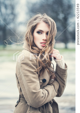 Beautiful woman fashion model outdoors 42213549