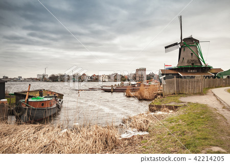Coastal dutch landscape with Windmill 42214205