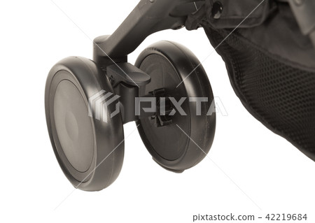 A stroller on a white background, details of a A stroller on a white background, details of a 42219684