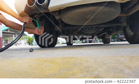 filling the gas tank car doughnut. 42222397