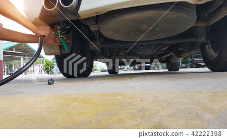 filling the gas tank car doughnut. 42222398