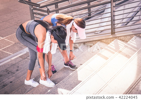 Women is exercising in the city Women is exercising in the city 42224045