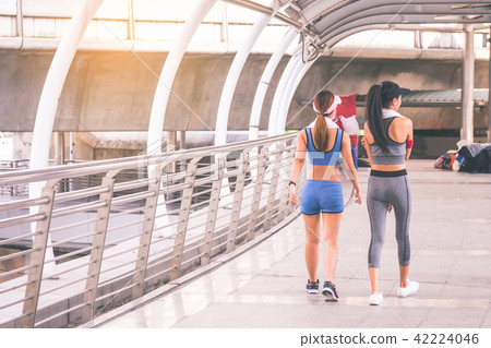 Women is exercising in the city Women is exercising in the city 42224046