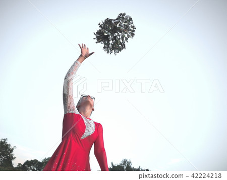 Teen Majorette Girl with Pom-poms 42224218
