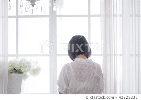 Girl enjoying a leisurely relaxing time on holiday 42225235