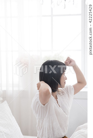 Girl enjoying a leisurely relaxing time on holiday Girl enjoying a leisurely relaxing time on holiday 42225429