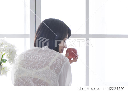 Girl enjoying a leisurely relaxing time on holiday 42225591