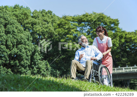 Nursing care senior female male helper caregiver 42226289