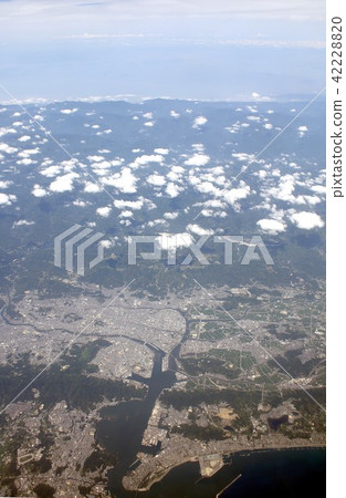 Looking over the skyline of Kochi City, Nankoku city around Kochi Port facing Tosa Bay in Kochi Prefecture, southern Shikoku 42228820