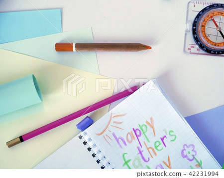 Compass, tools, notepad with a congratulation to t Compass, tools, notepad with a congratulation to t 42231994