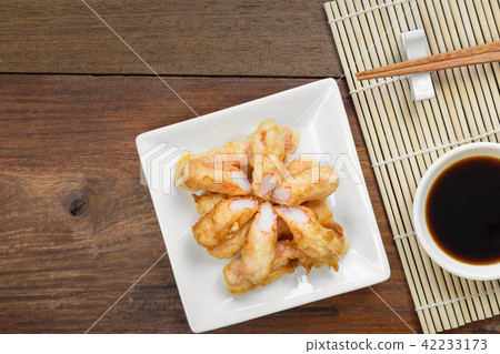 fried crab sticks in a ceramic plate 42233173
