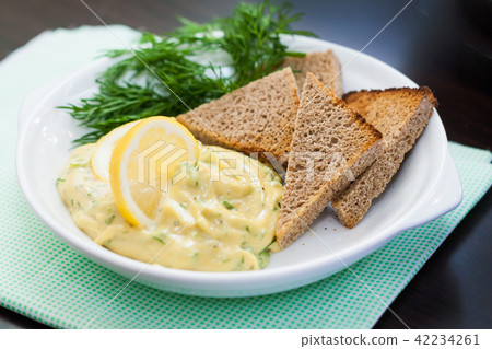 mayonnaise sauce with slices of lemon and dill mayonnaise sauce with slices of lemon and dill 42234261