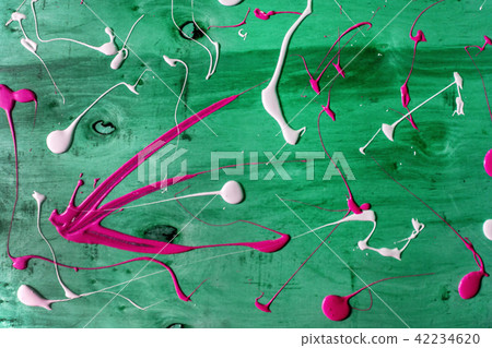 Artist working wooden table top with paint  marks 42234620