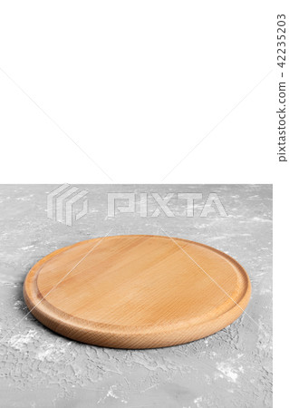 Top view bright empty wooden dish on black stone 42235203