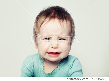Crying baby face (6 months old) Crying baby face (6 months old) 42235222