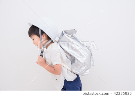 A boy wearing a helmet 42235923