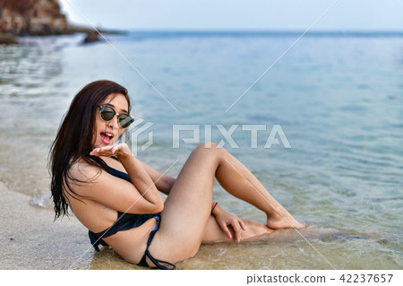 Sexy girl concept in swimsuit. Beautiful woman wearing a swimsui 42237657