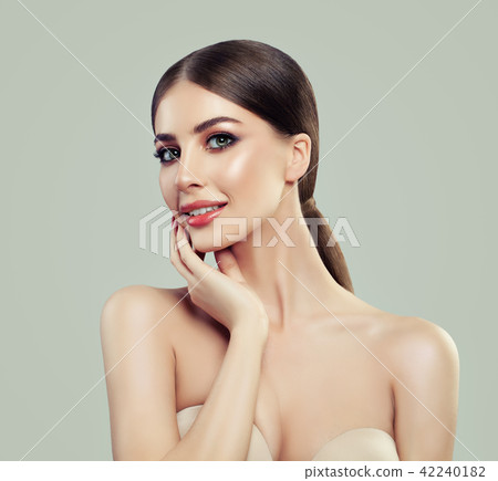 Cute Smiling Woman Spa Model with Healthy Skin 42240182
