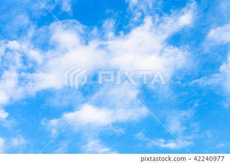 white clouds in blue evening sky in summe 42240977