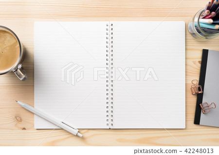 Top view of spiral notebook, pen for mockup Top view of spiral notebook, pen for mockup 42248013