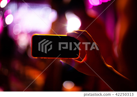 People taking photographs with smart phone People taking photographs with smart phone 42250313