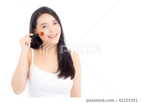 Beauty asian woman applying make up with brush of  42253301